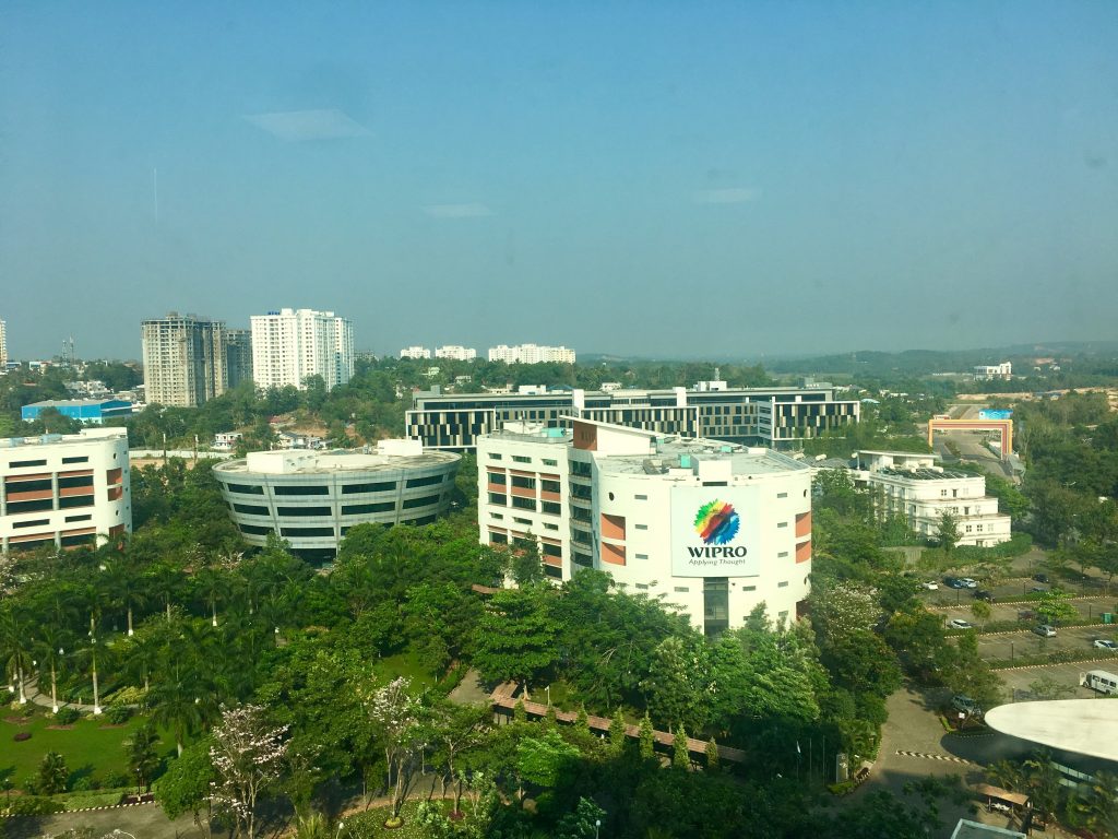 Why is Aluva a popular place to settle down?